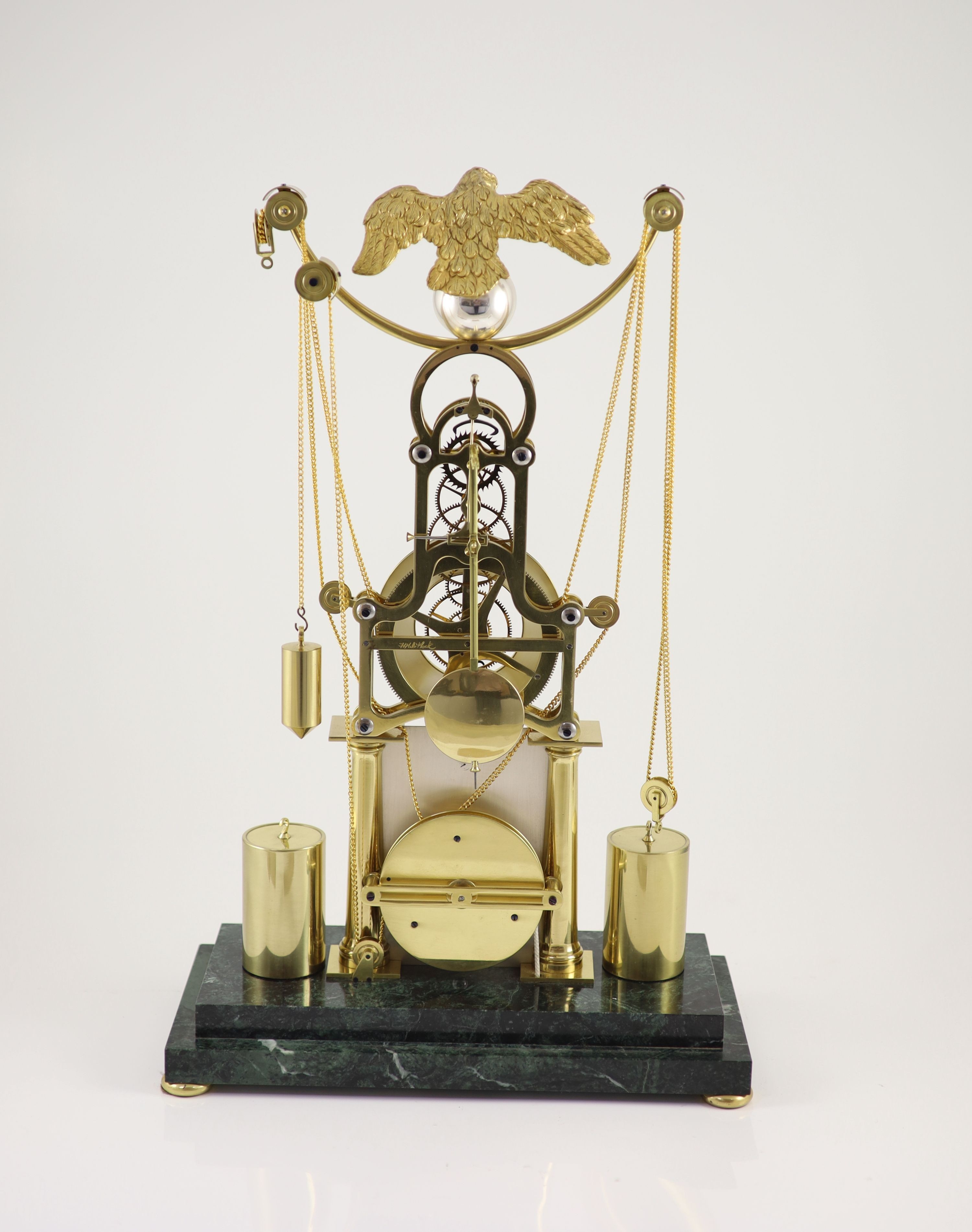 An F.H.Whitlock Empire style brass skeleton clock H 54cm. W 35cm. D 16cm.